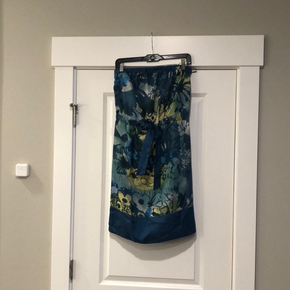 Strapless mini dress with batik style print.
